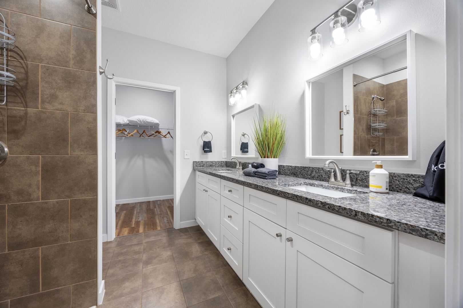 The master ensuite offers a double vanity, walk-in shower