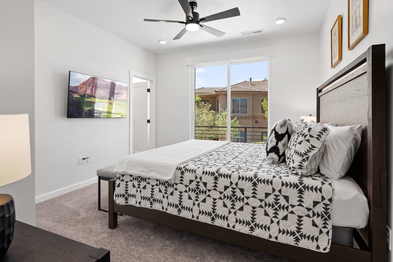 This tranquil king balcony suite features an ensuite bath & smart TV