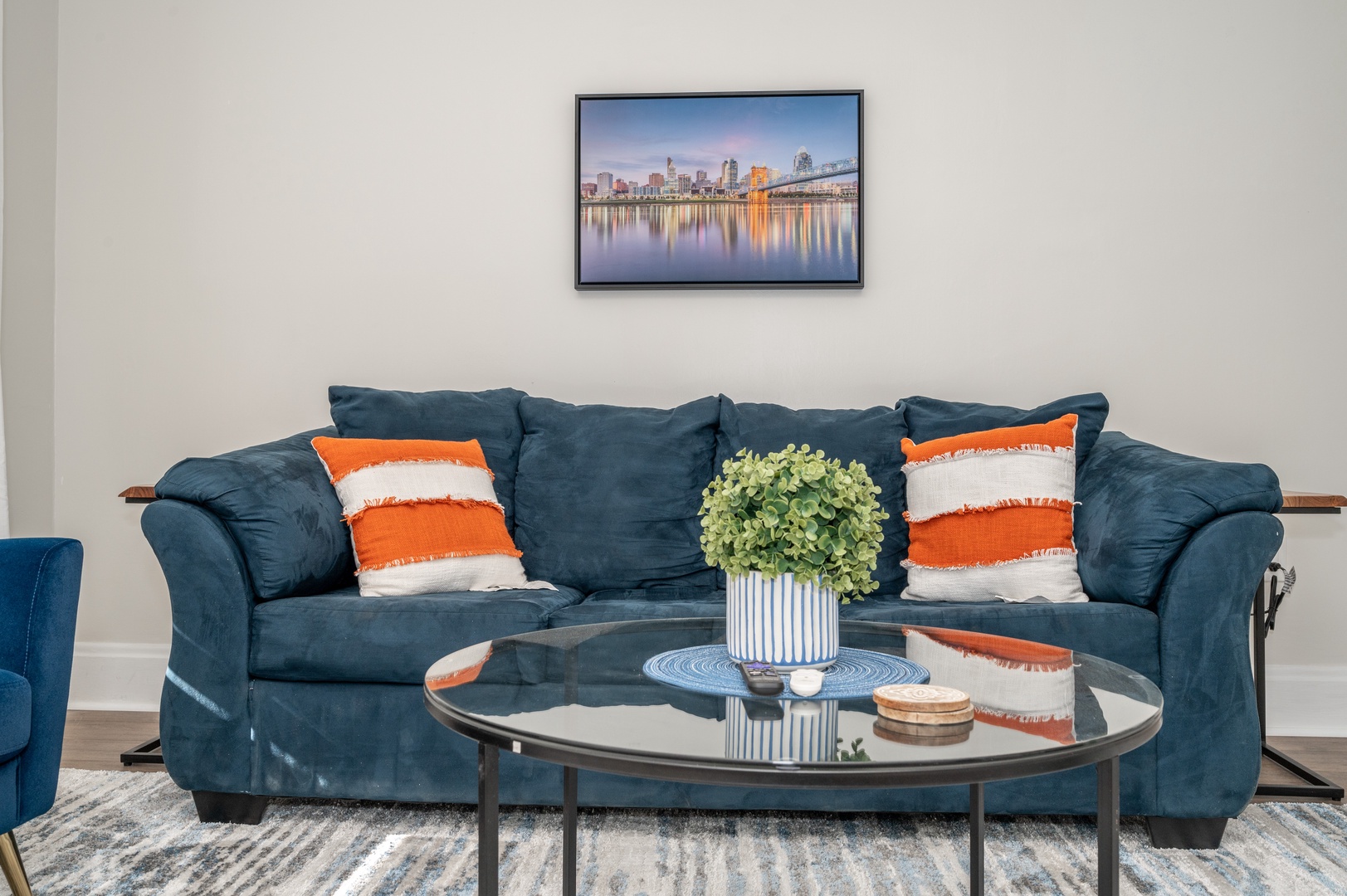 Curl up in Apartment A’s chic living room & stream your favorite entertainment