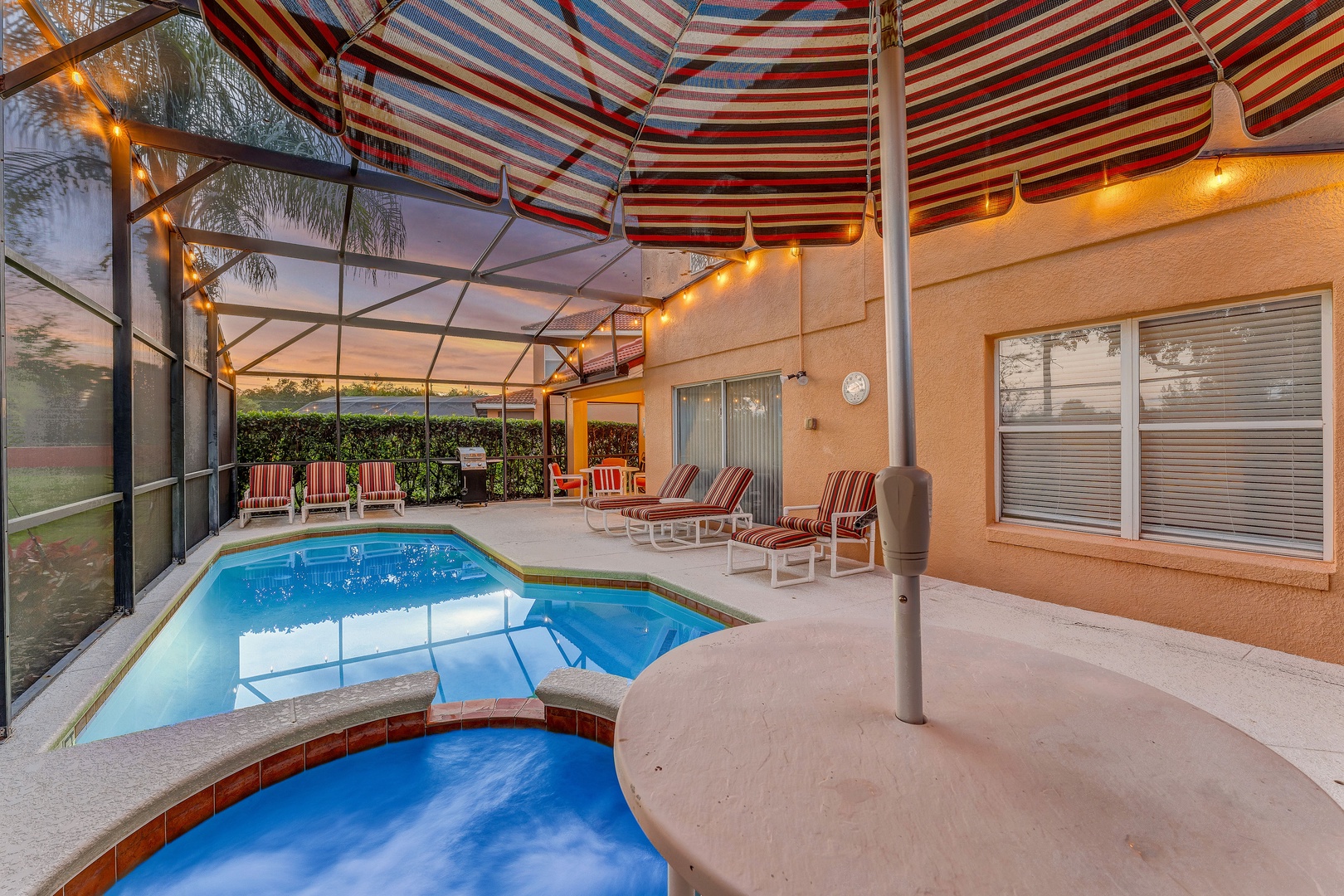 Private covered pool and hot tub with our seating