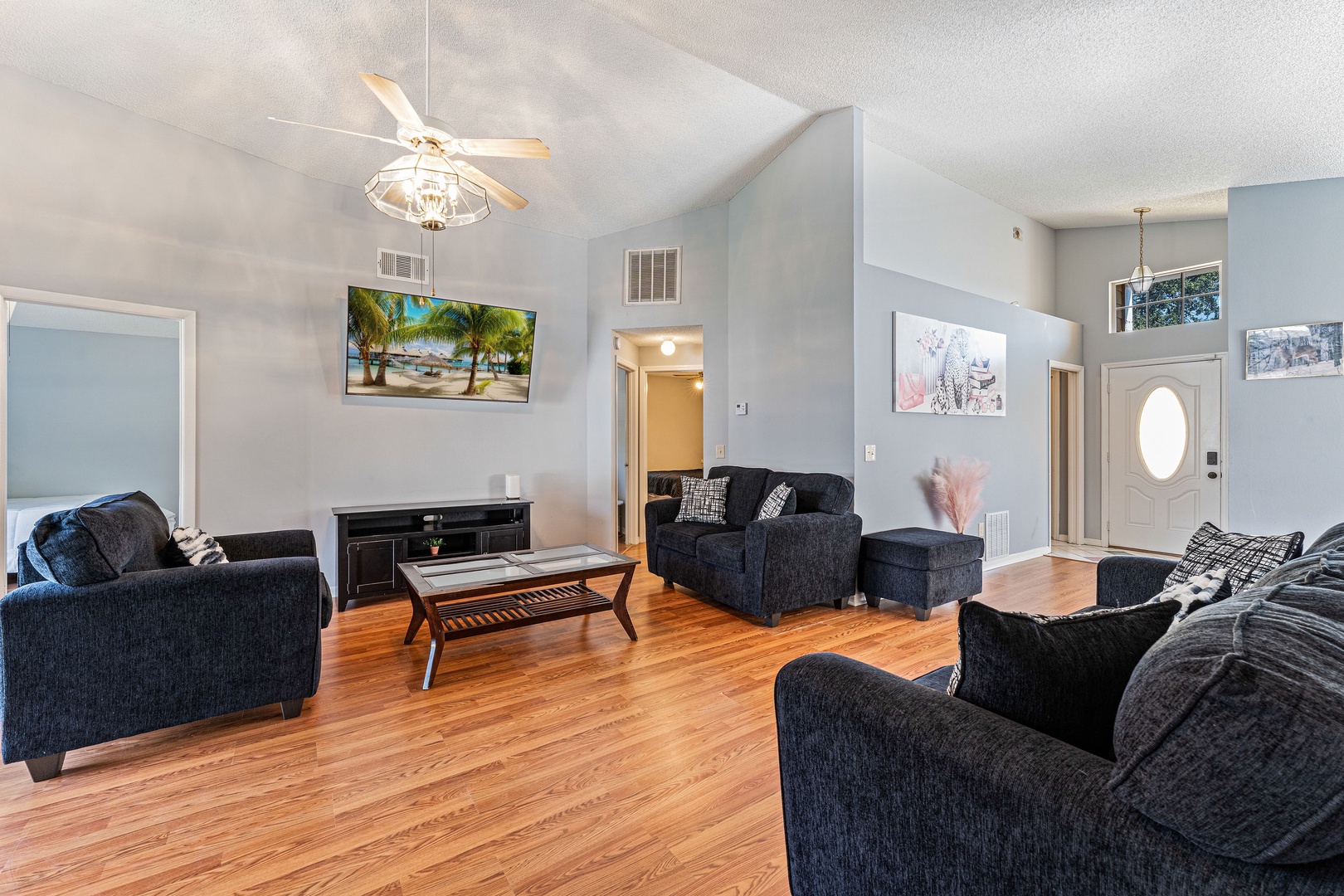 Living area with ample seating and Smart TV