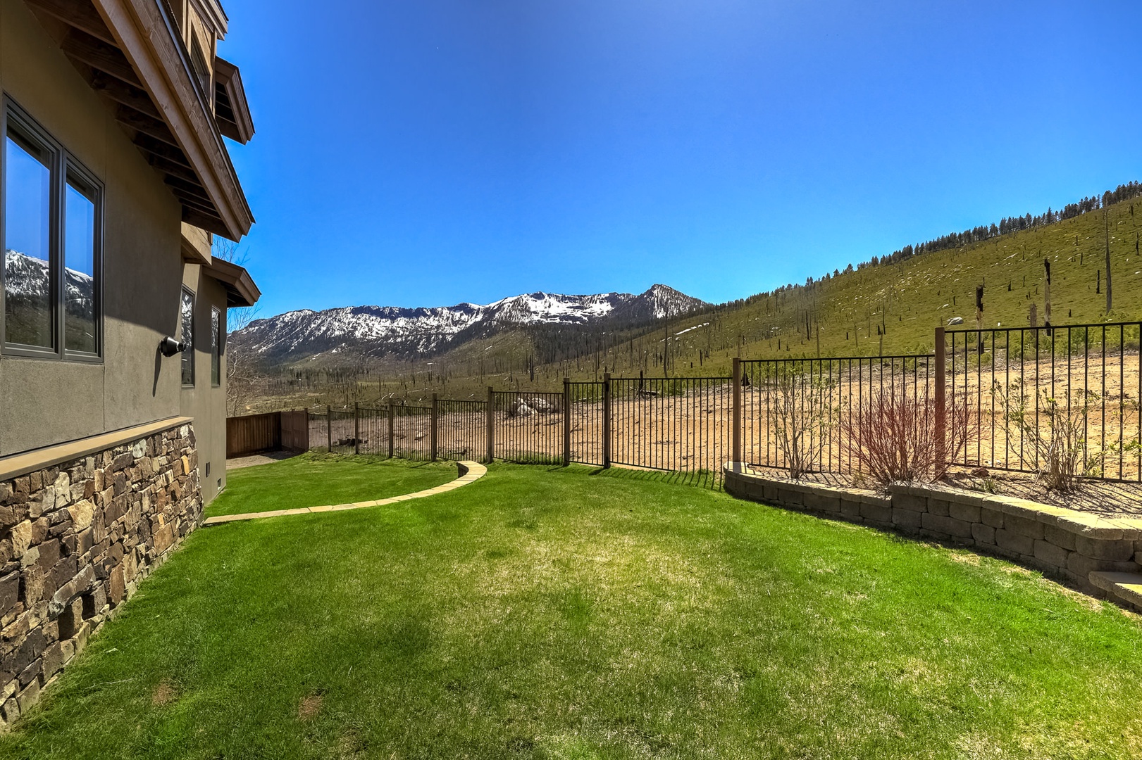 Spacious backyard with gate access for a walkabout