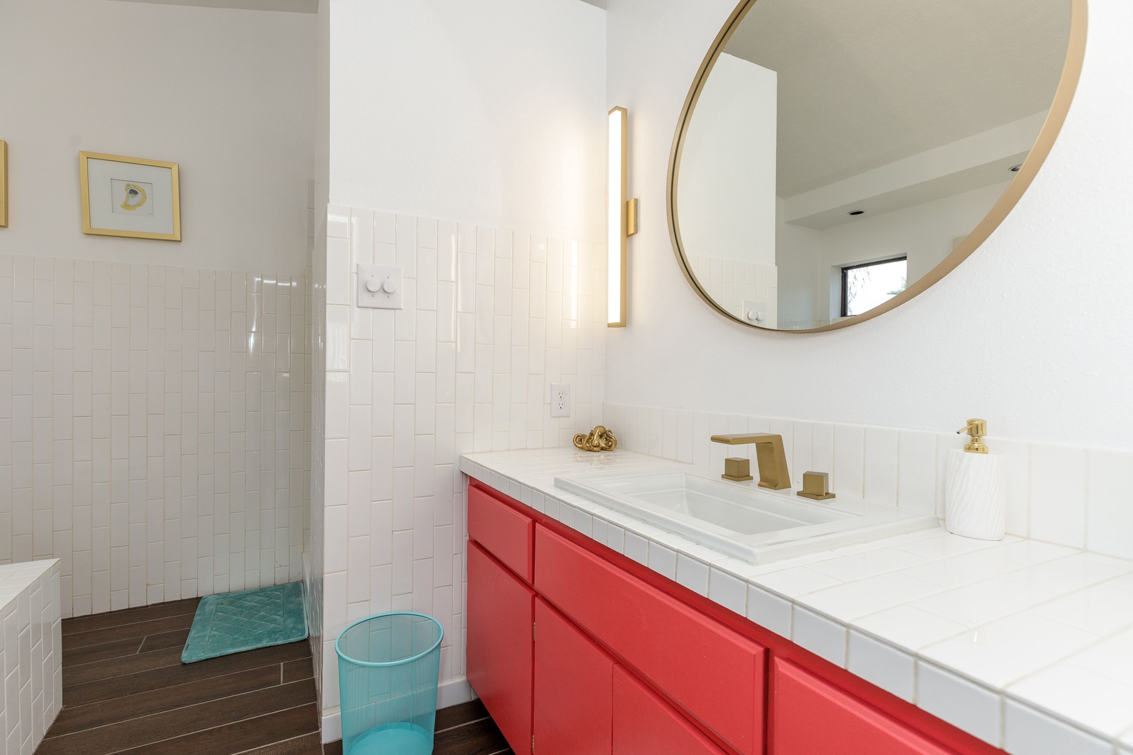 The king en suite offers a large single vanity, shower, & luxurious soaking tub