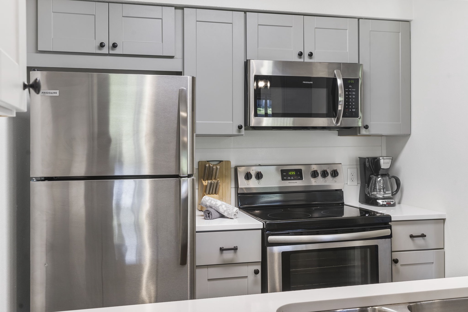 The updated kitchen offers ample storage space & all the comforts of home