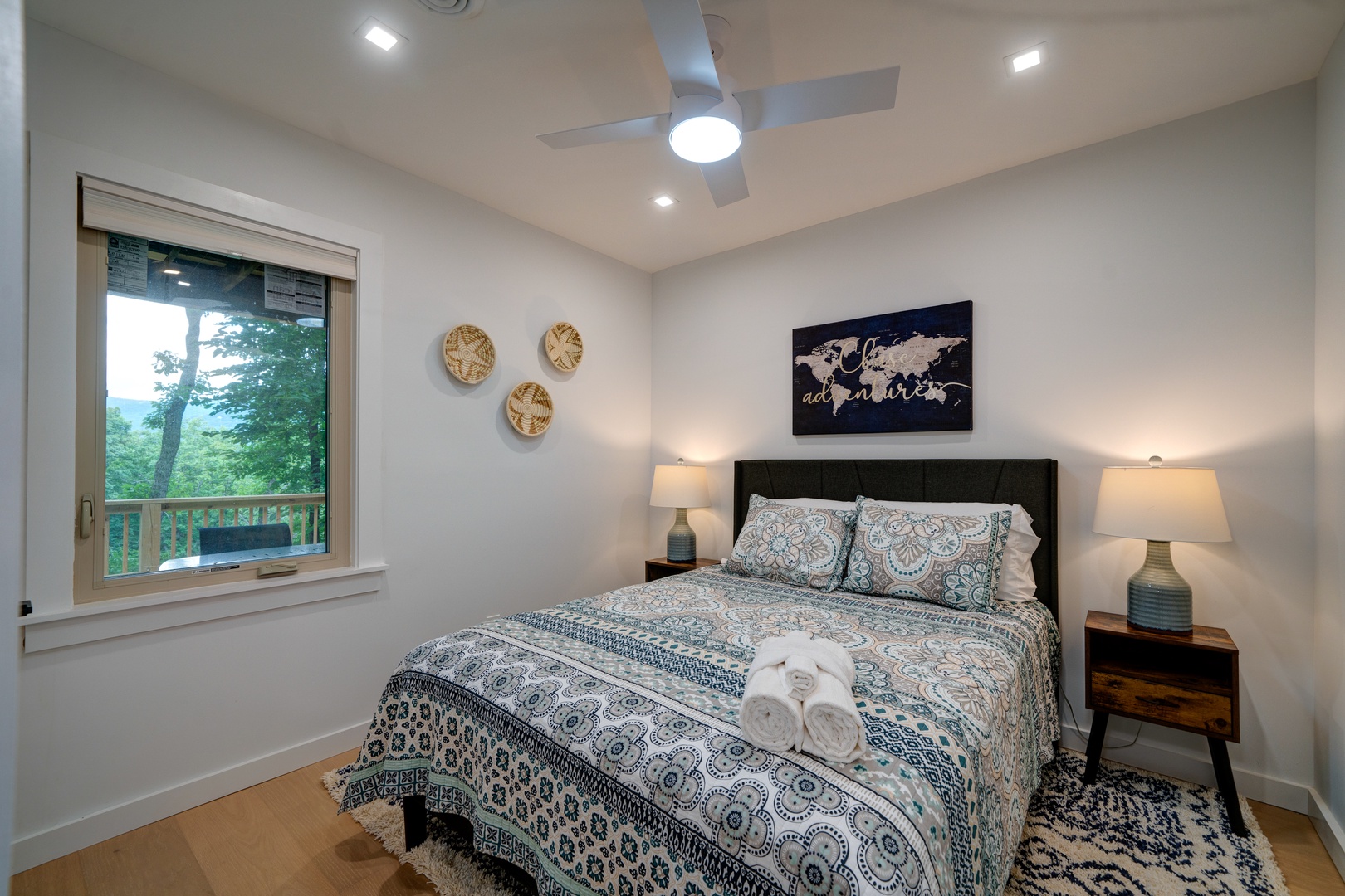 This lower-level queen bedroom is ideal for a serene afternoon snooze