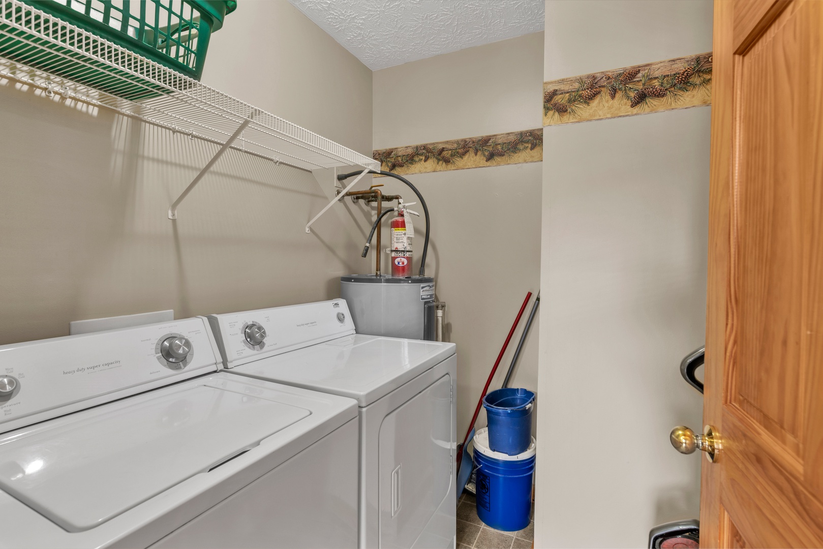 Private laundry is available for your stay, tucked away in the half bath area
