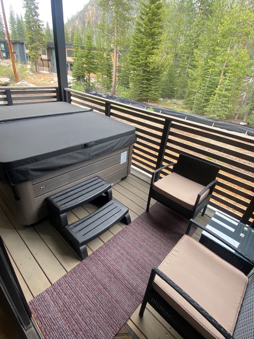 Private hot tub on the unit balcony for year-round use