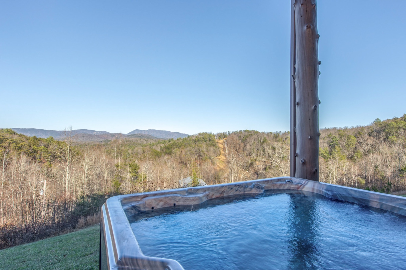 Soak the day away & take in the views in the private hot tub
