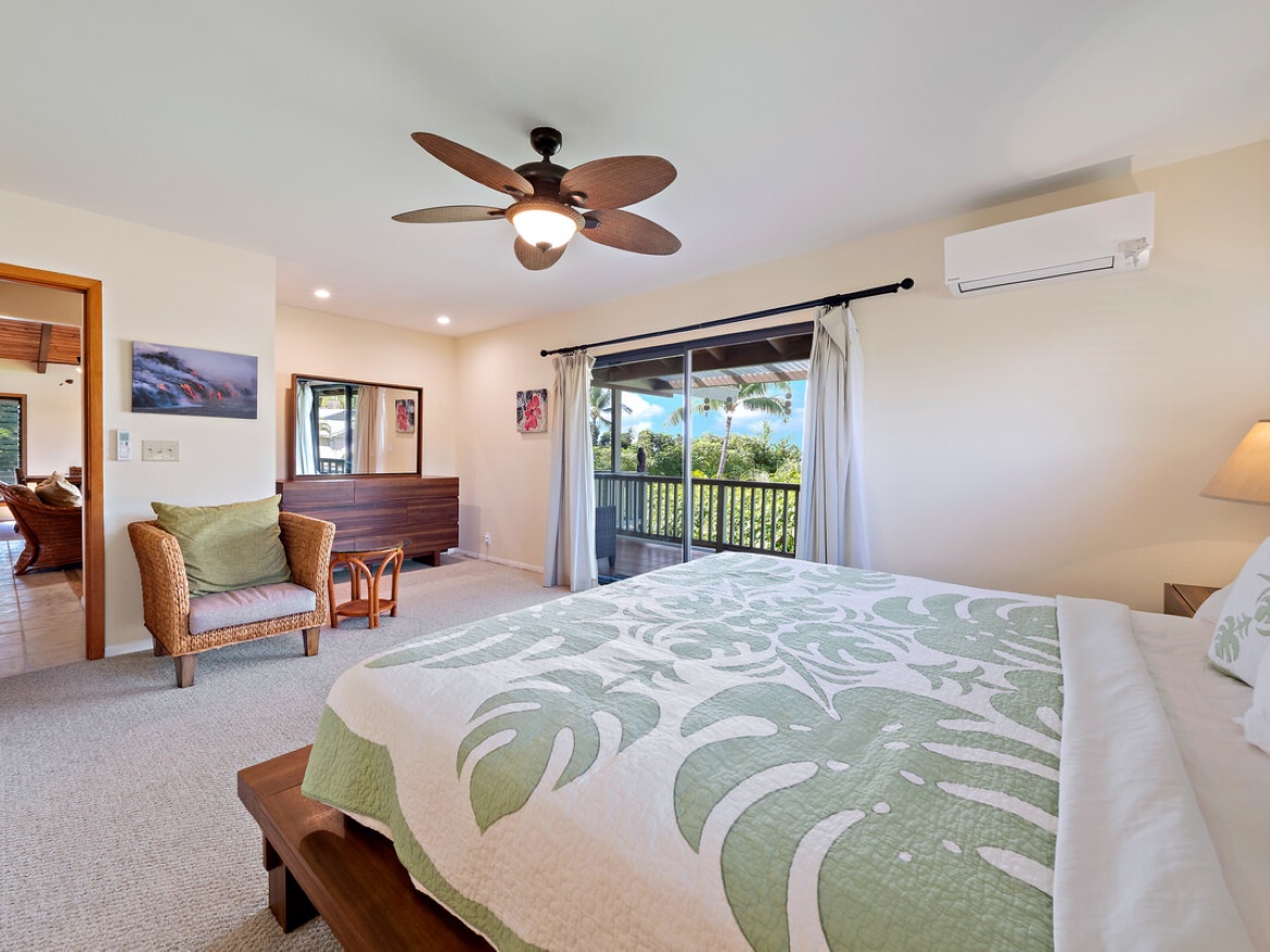 Bedroom 1 with King bed, lanai access, and en-suite