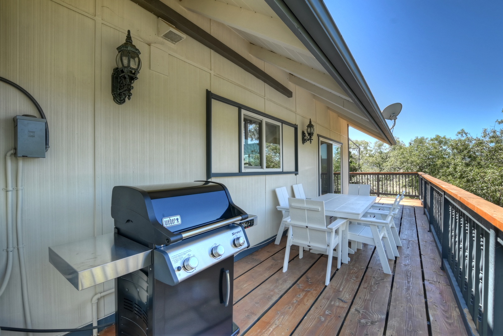 Deck with outdoor seating and grill