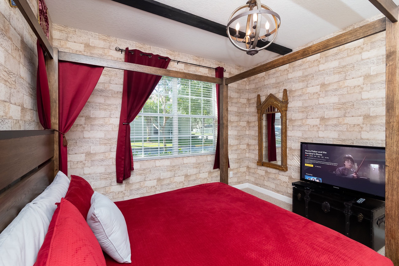 Bedroom 1 Harry Potter themed with King bed, TV, and en suite (1st floor)
