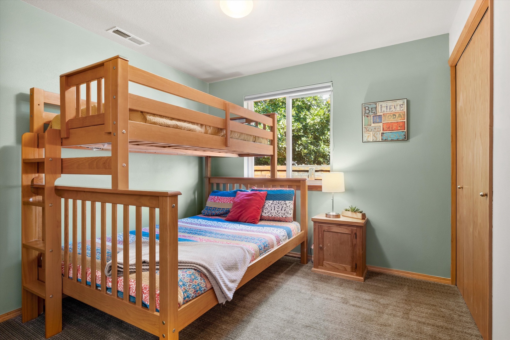 The second bedroom sanctuary offers a cozy twin-over-full bunkbed