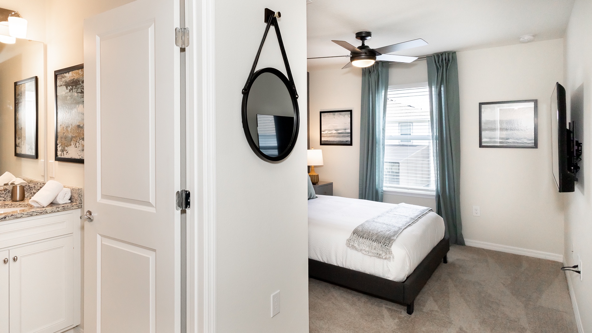 Bedroom 5 offers a queen bed, Smart TV, & private en suite
