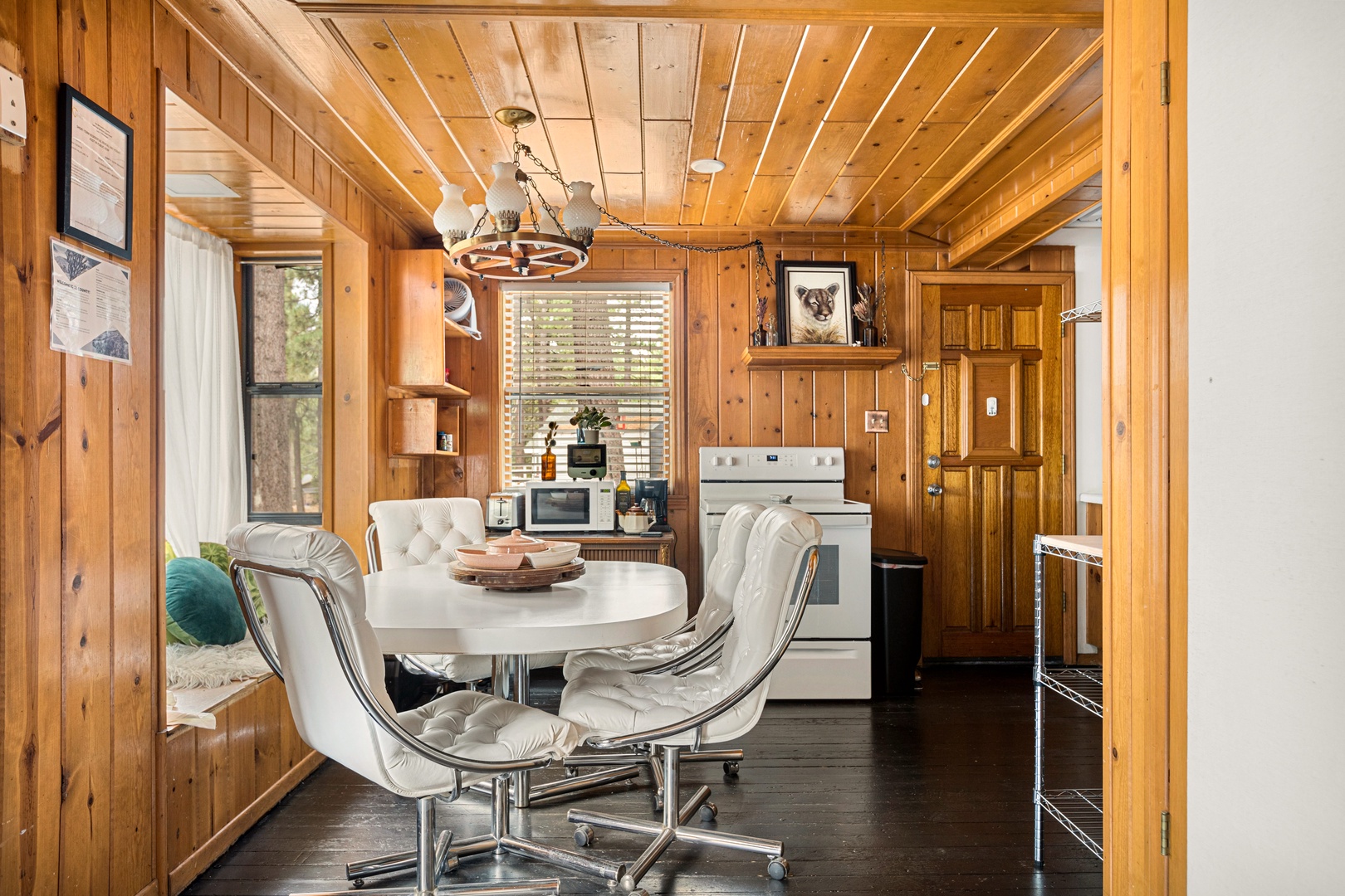 Dining area with table and seating for 4-6