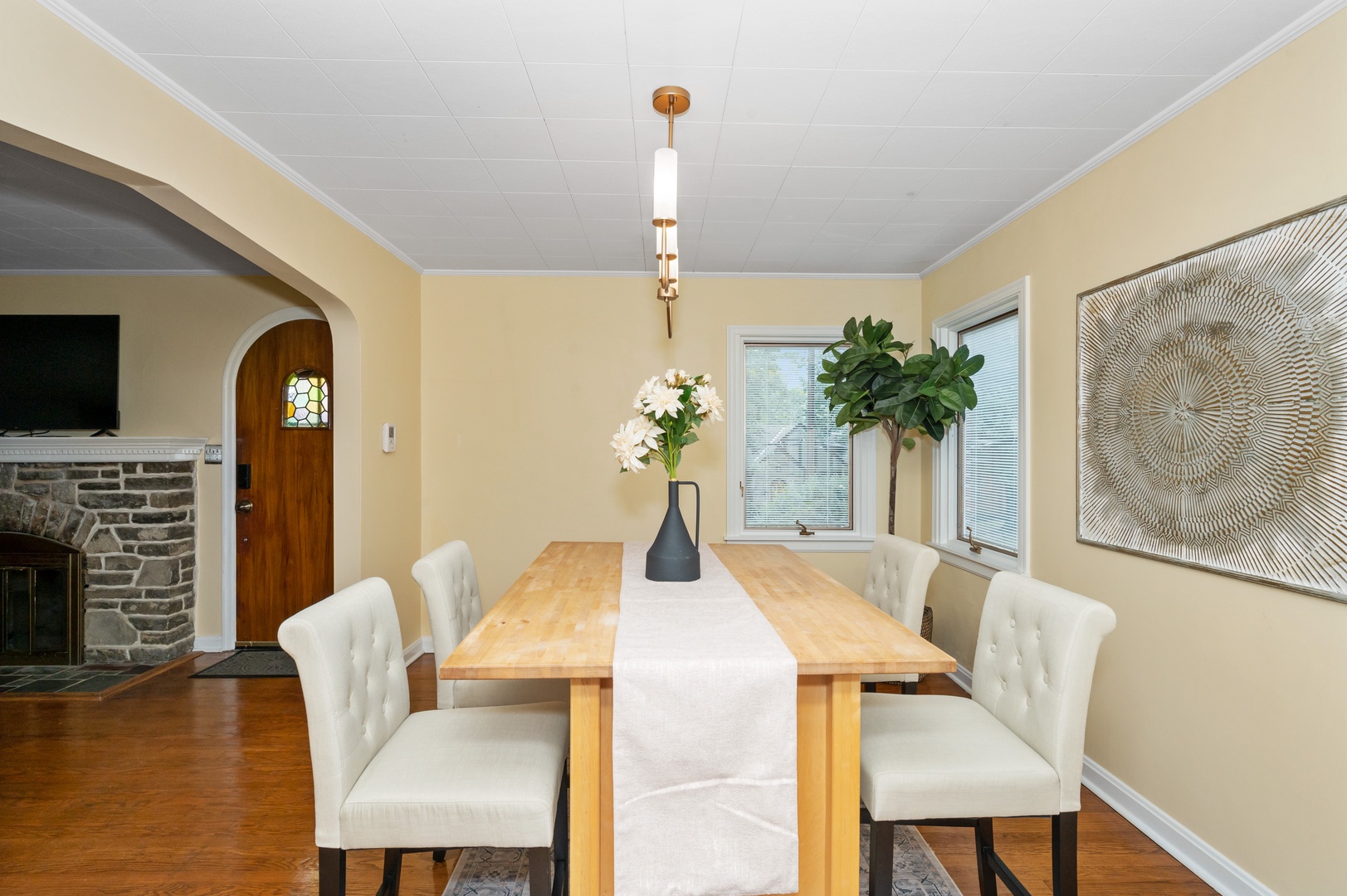 Elegant meals can be enjoyed at the dining table, offering seating for 4