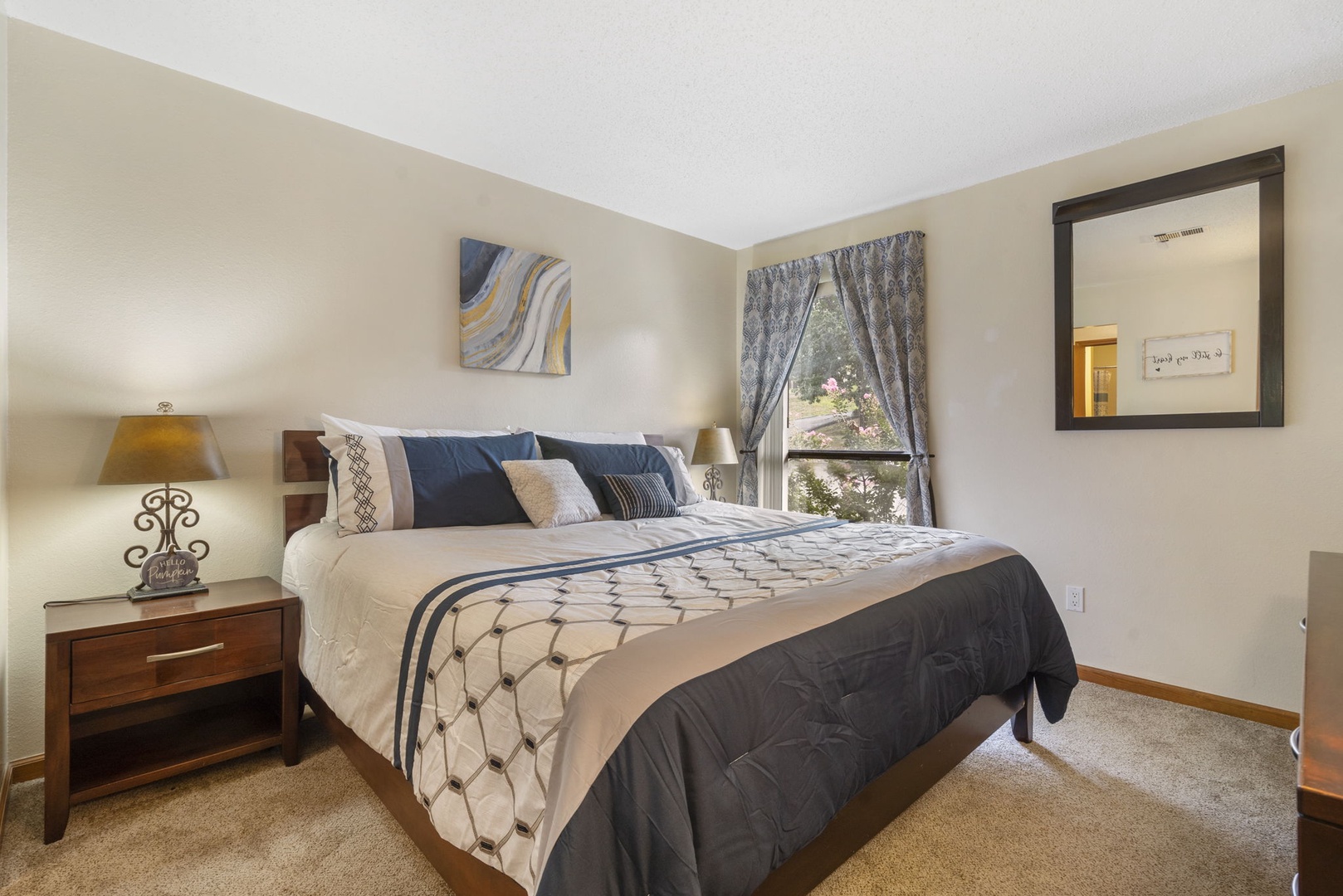 The king suite offers a private en suite, TV, and plenty of space to relax