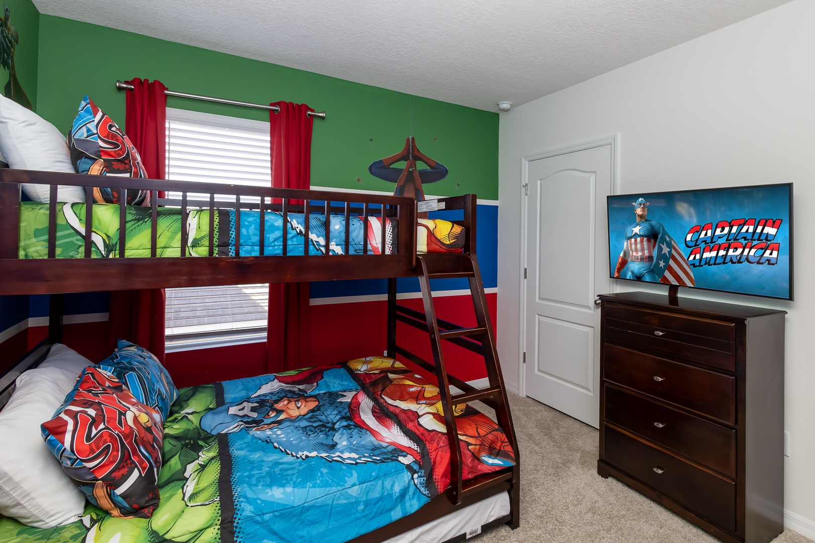 This cozy full/twin bunkbed with a trundle bedroom, includes a smart TV