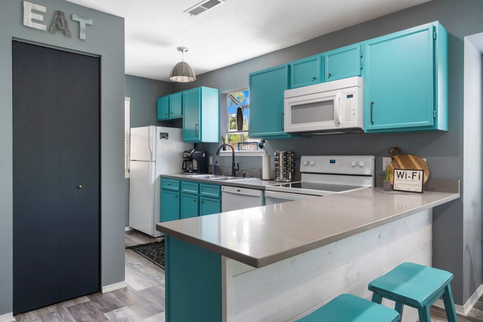 Unit 3 – The open Kitchen offers plenty of amenities and additional counter seating for 2