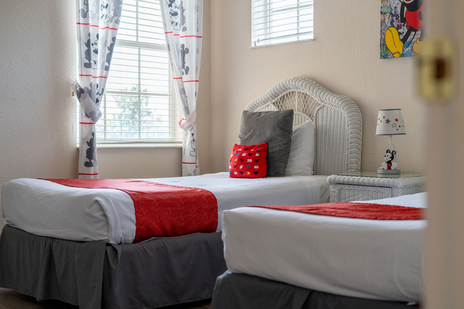 A pair of cozy twin beds & TV await in the final bedroom retreat