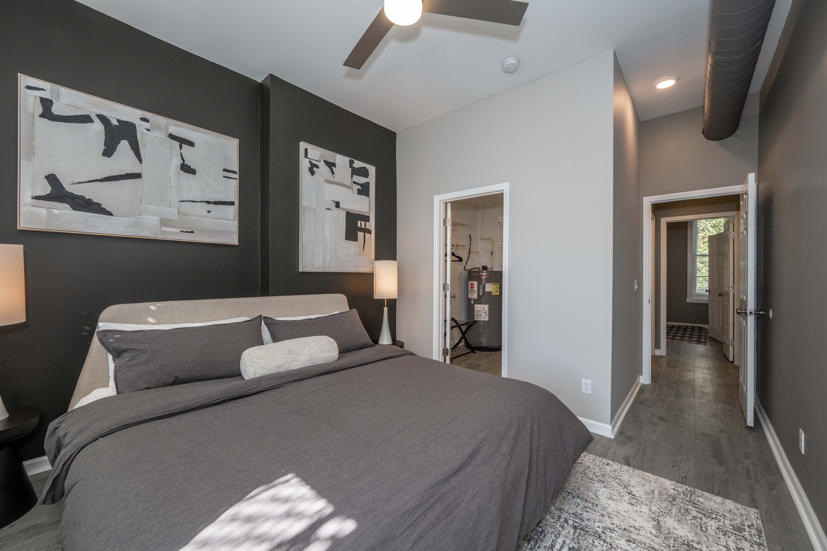 This unit’s cozy king bedroom includes balcony & laundry access