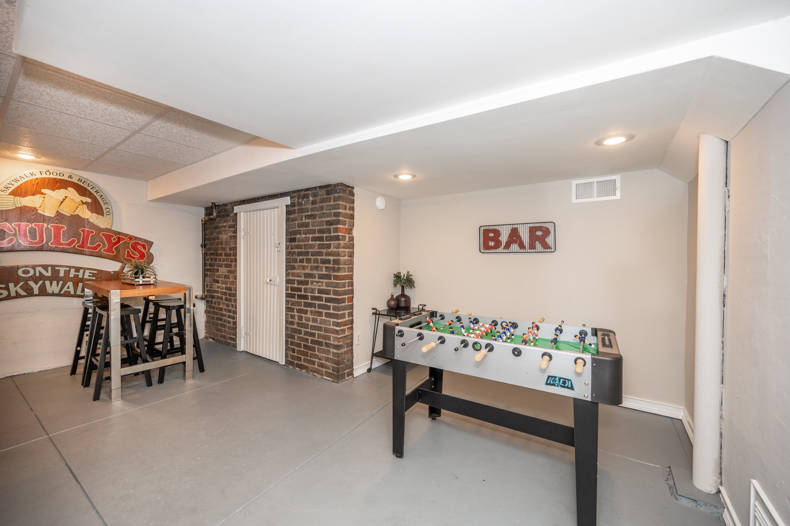 Hang out at the foosball table or relax with a cocktail in the lower-level game room