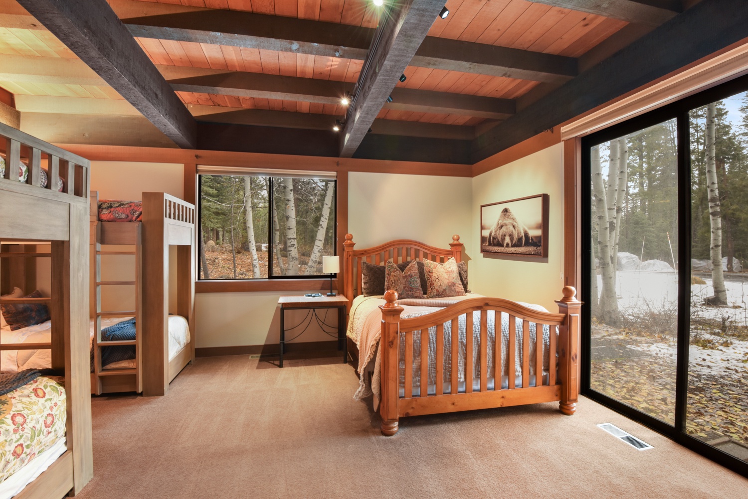 Bedroom 3 with 2 twin/twin bunk beds, full/full bunk, queen bed, Smart TV, patio access, and ensuite