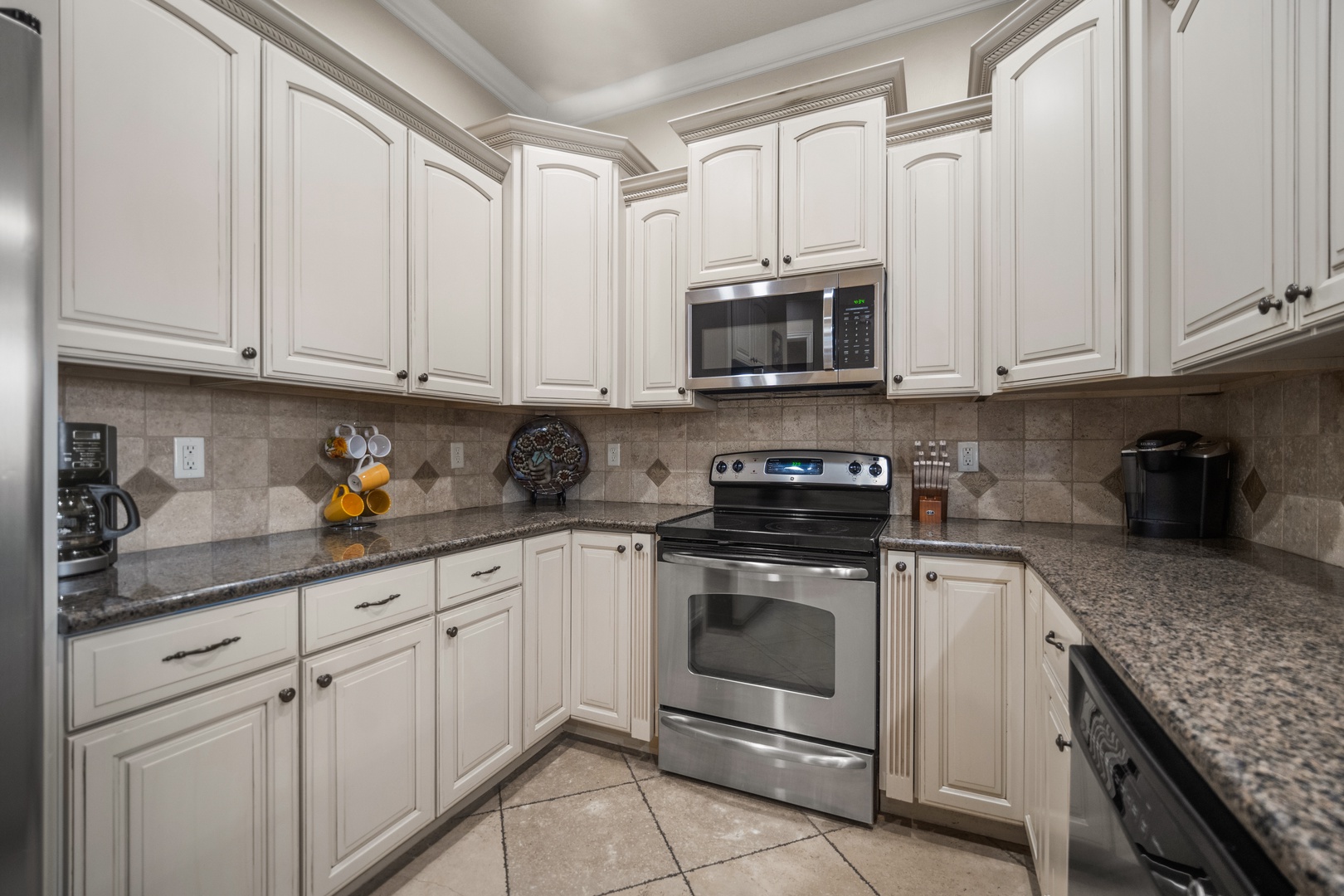 The updated kitchen offers ample space & every home comfort