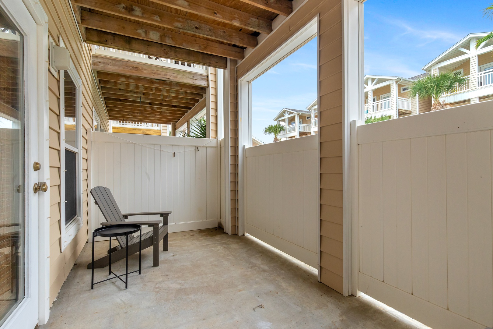 Kick back & relax with privacy on the ground-level patio