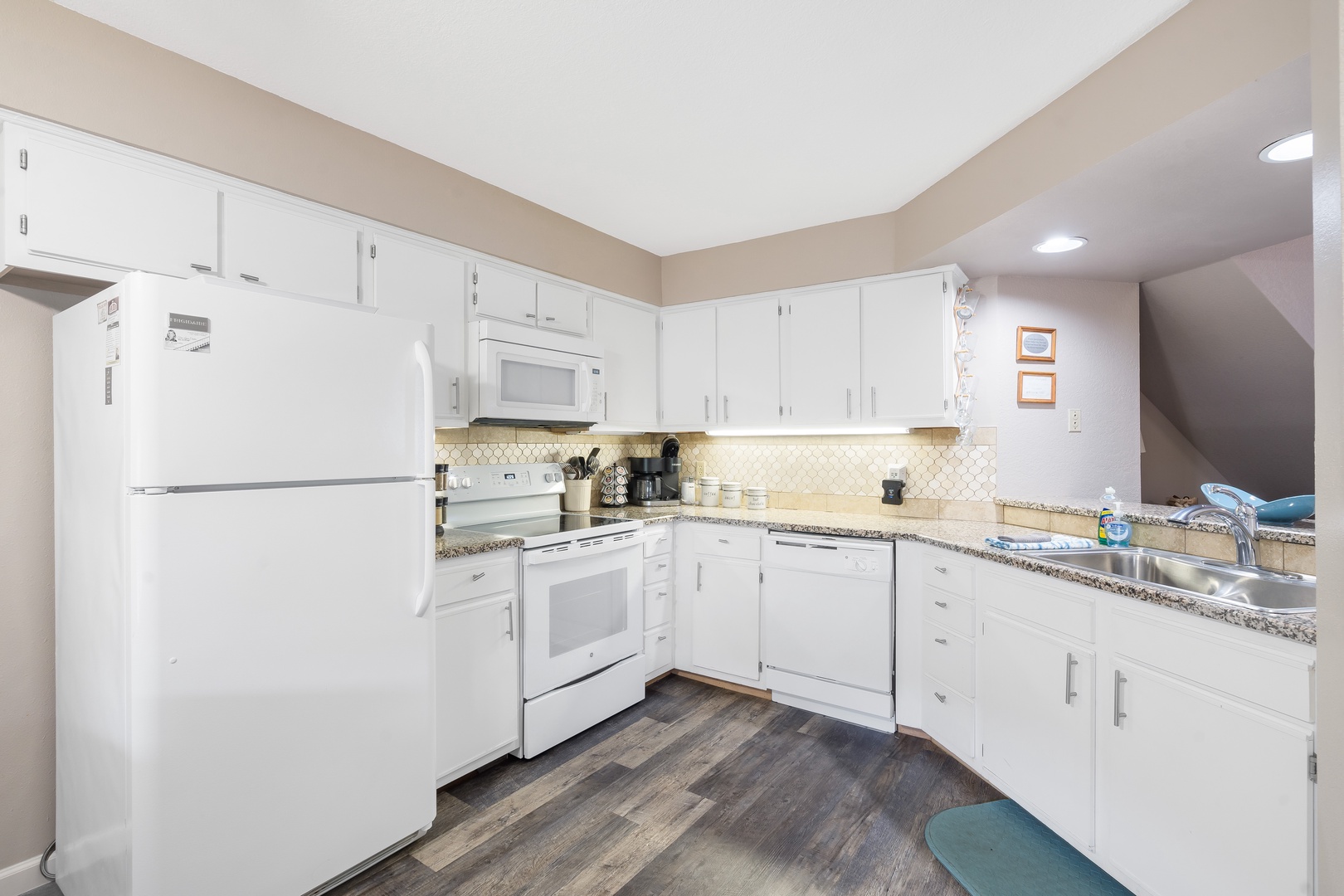 Fully equipped kitchen with Keurig coffee maker, toaster and more