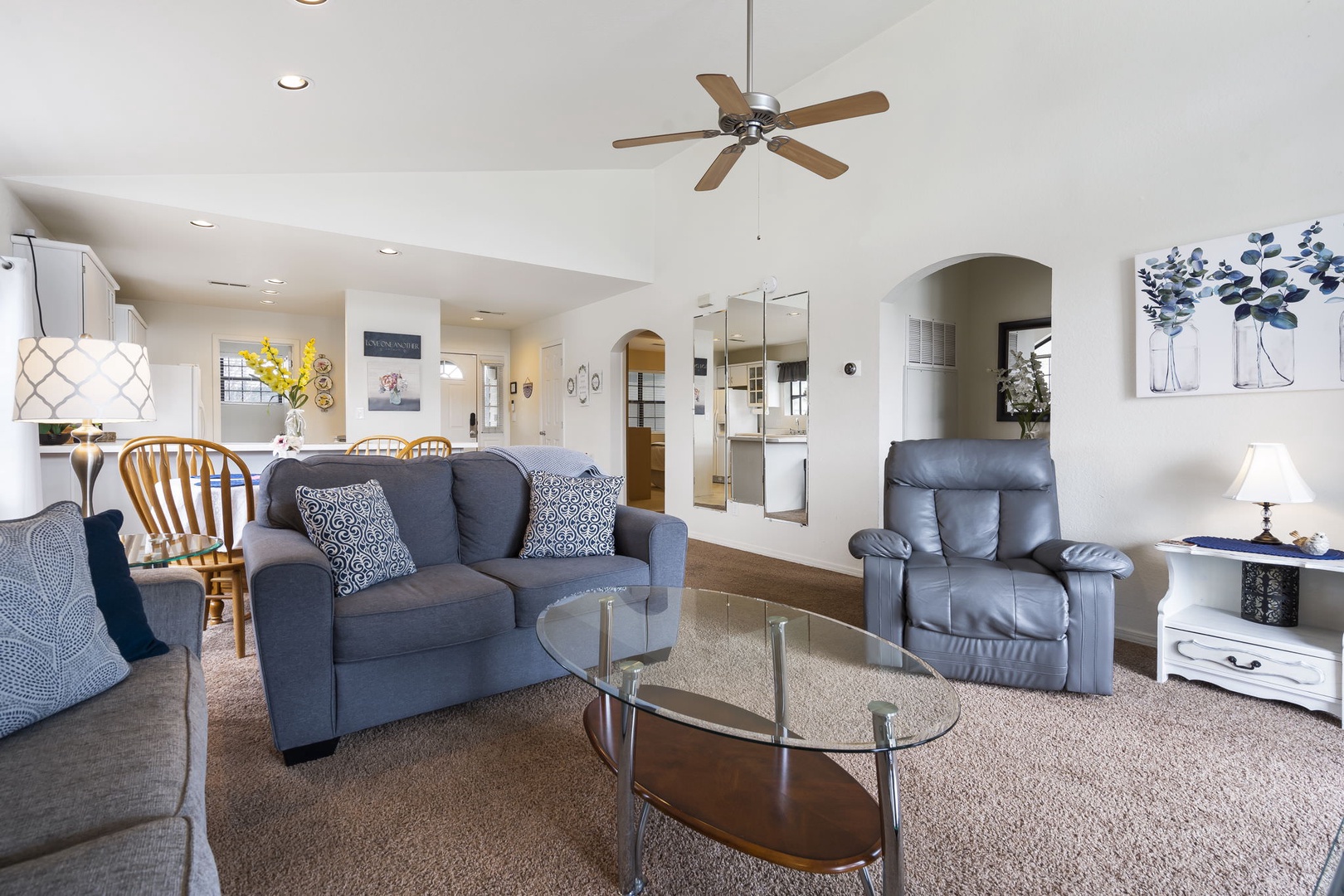 Cozy and spacious living area with TV