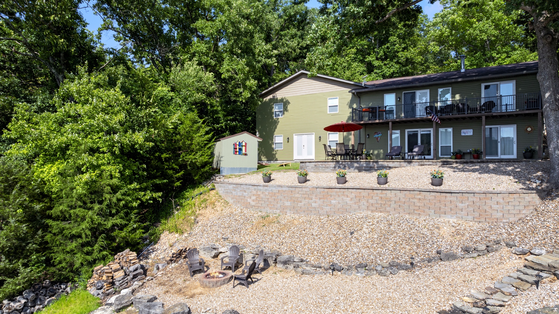 Enjoy the lakeside patio and fire pit for a perfect blend of comfort and scenic views