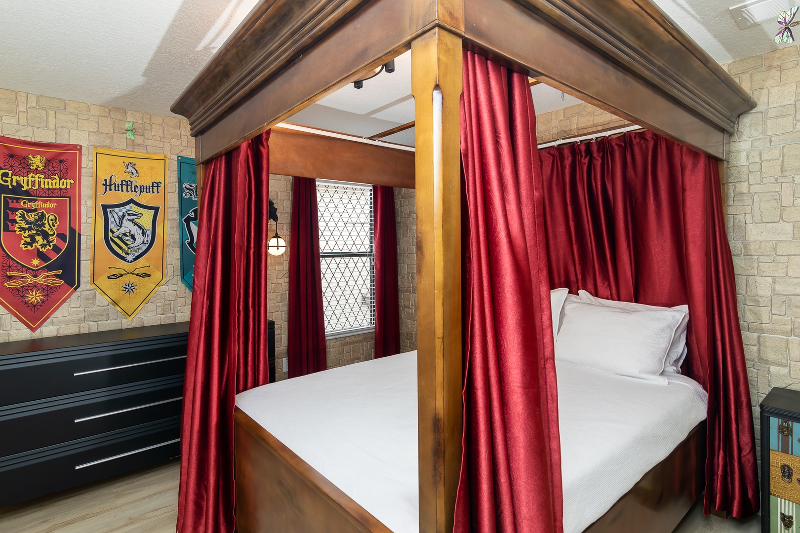 Sleep like a wizard in this enchanted Harry Potter suite, with a queen bed!