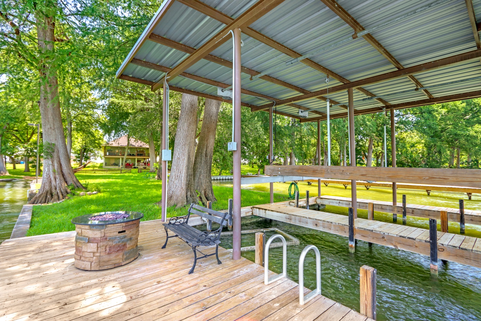 Lounge by the second firepit on the spacious dock!