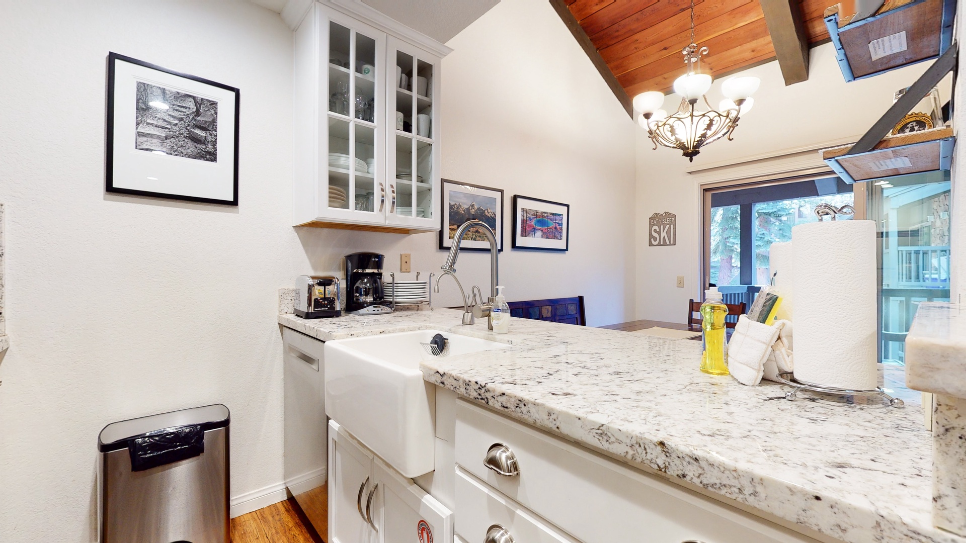 Kitchen with toaster, drip coffee maker, blende, and more