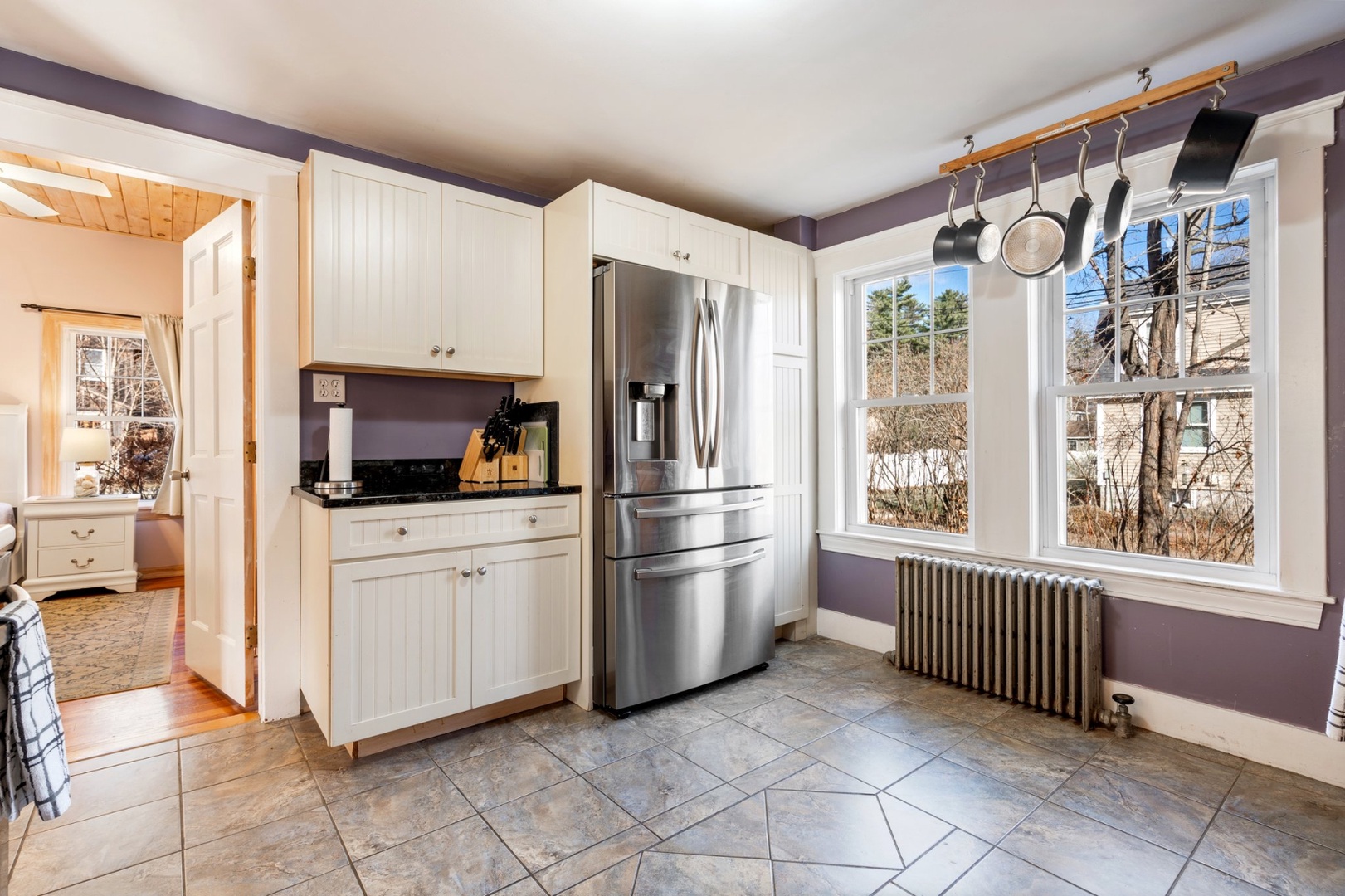 The open, airy kitchen offers ample space & all the comforts of home