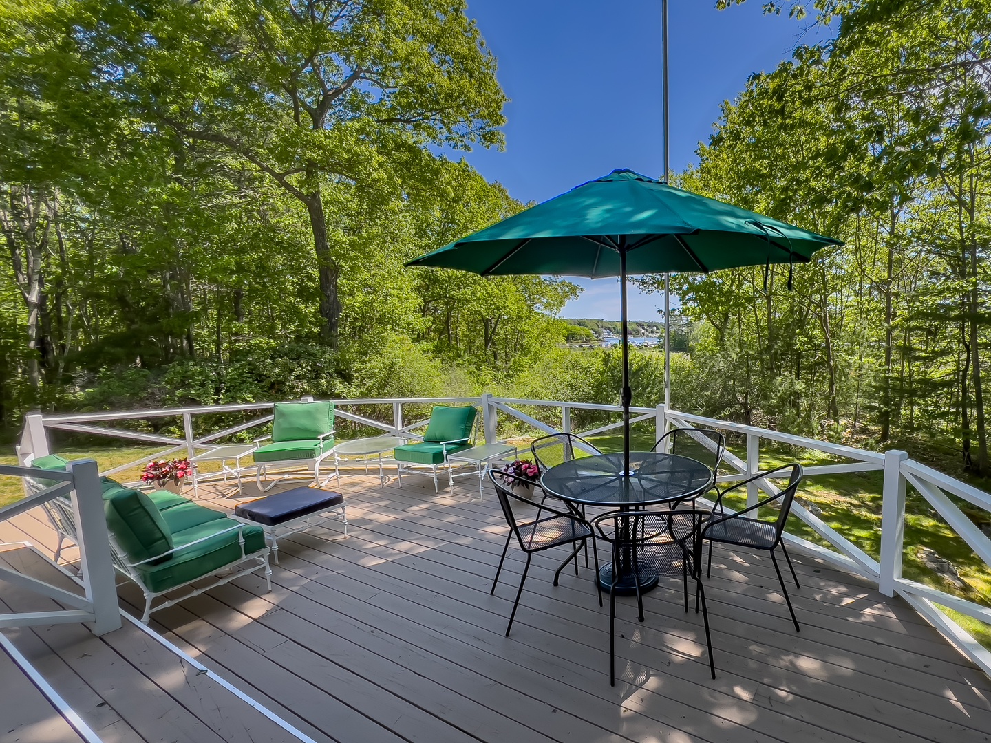 Lounge on the deck furniture while soaking in the Harbor View