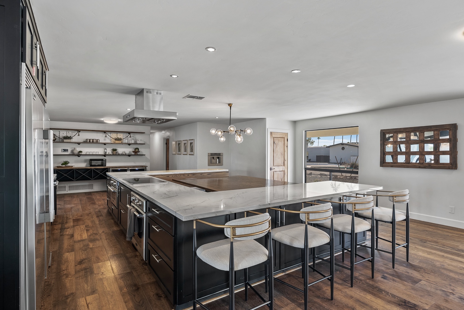 Dining and kitchen area with booth-style seating and full culinary amenities