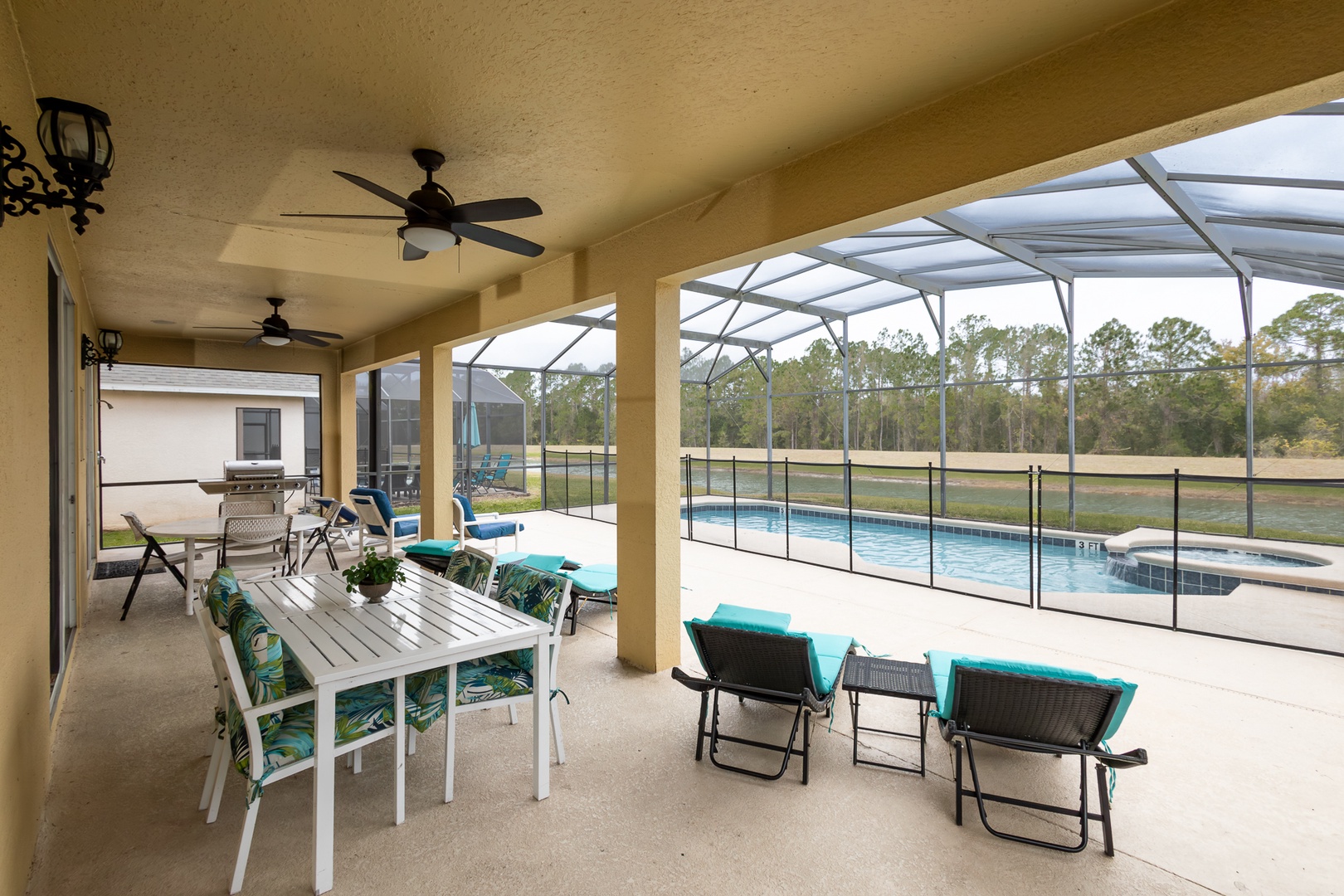 Dine alfresco or enjoy a cocktail on the screened patio