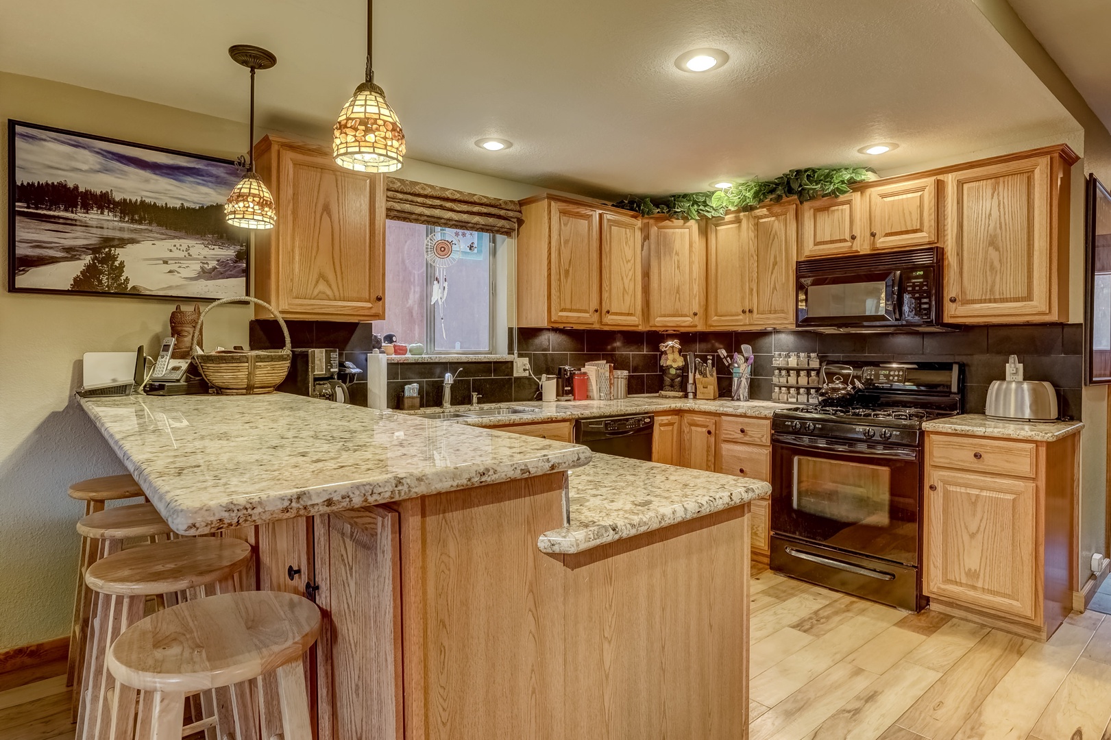 Kitchen with drip coffee maker, Keurig, toaster, and more