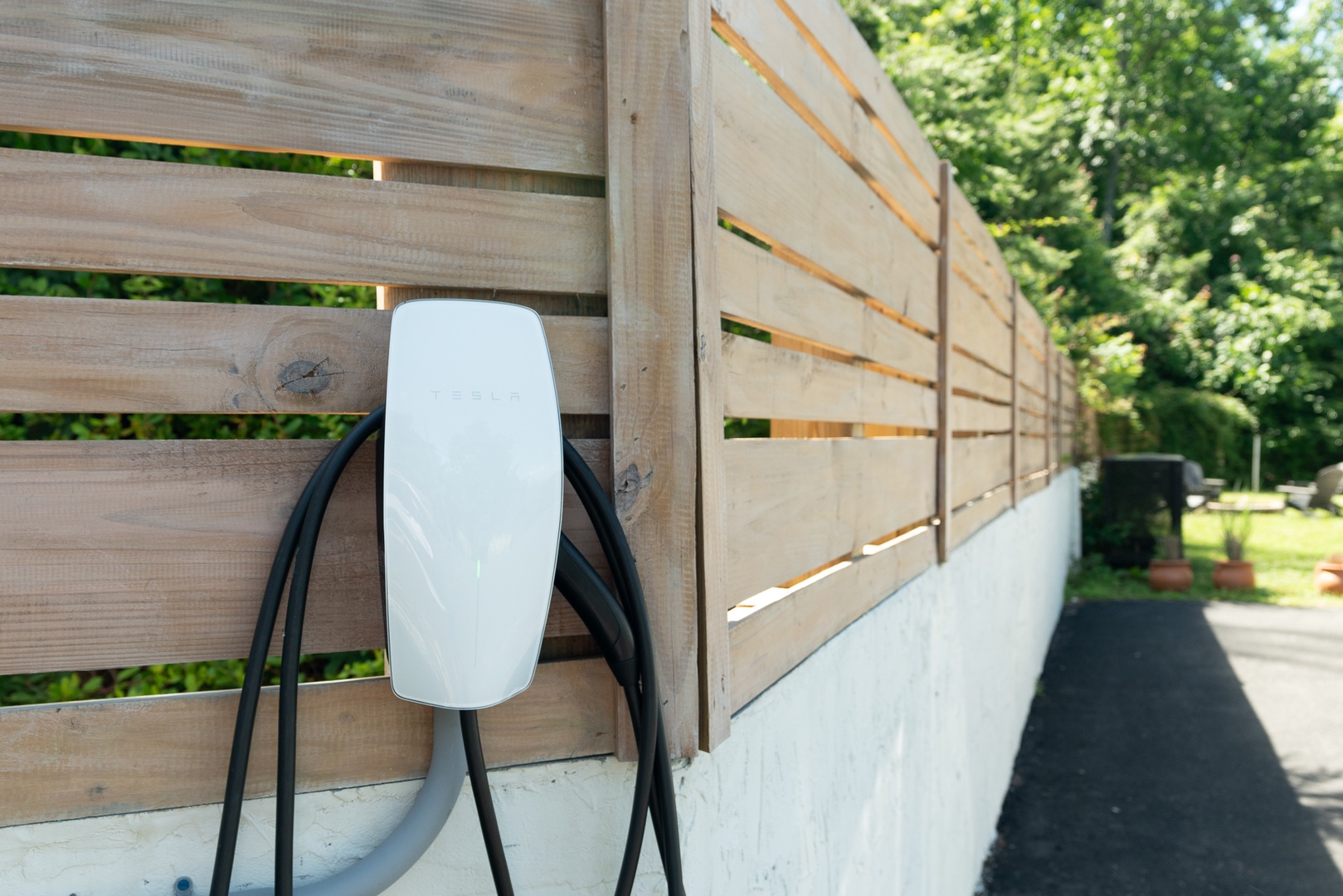 A shared EV charger is available for eco-friendly travel