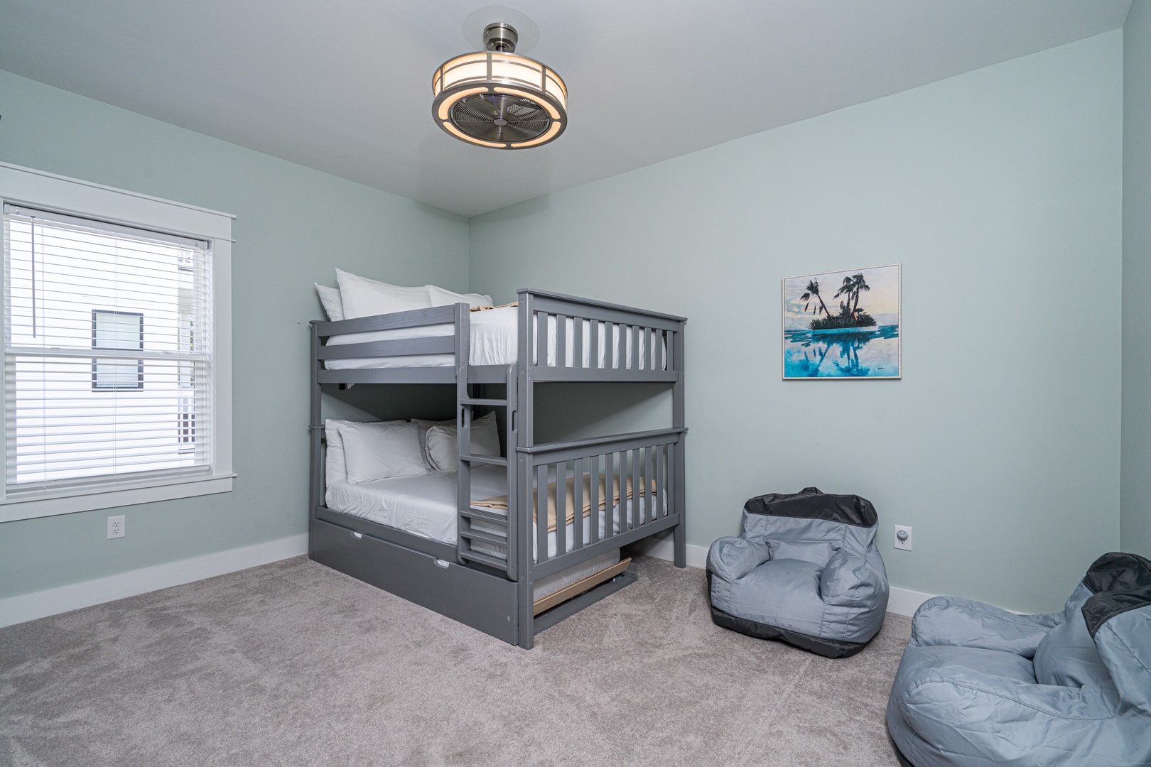 Bedroom 3 with queen/queen bunk bed, twin trundle, and Smart TV