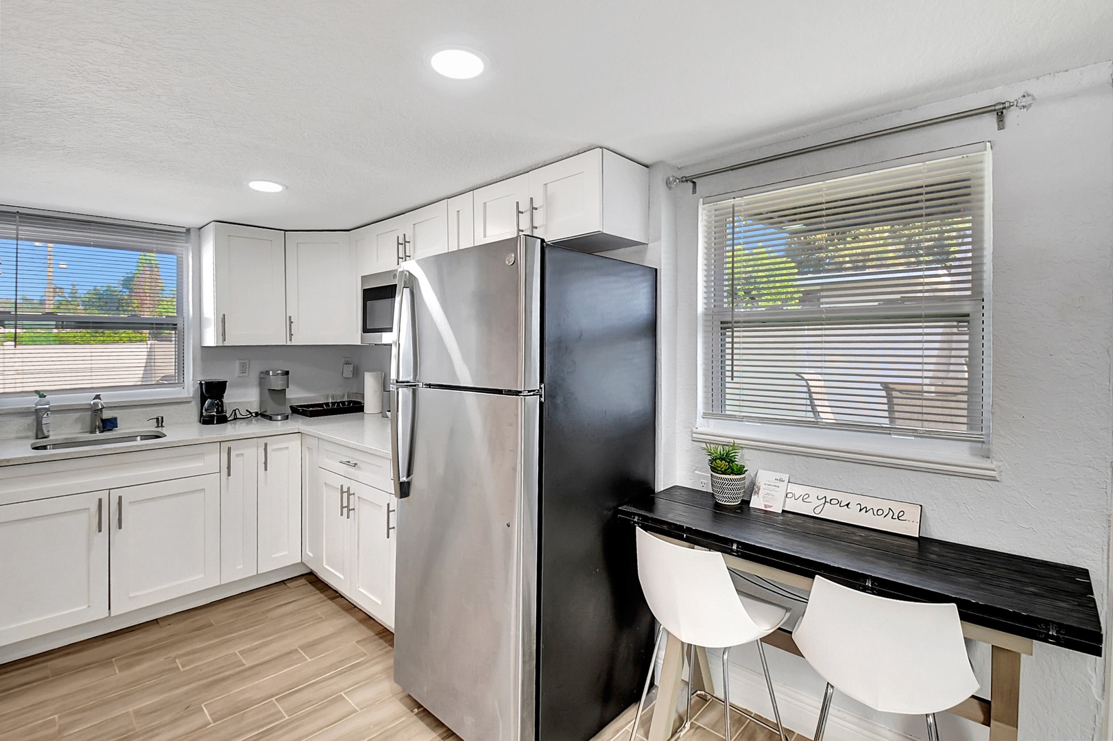 The streamlined kitchen is well-equipped for your visit