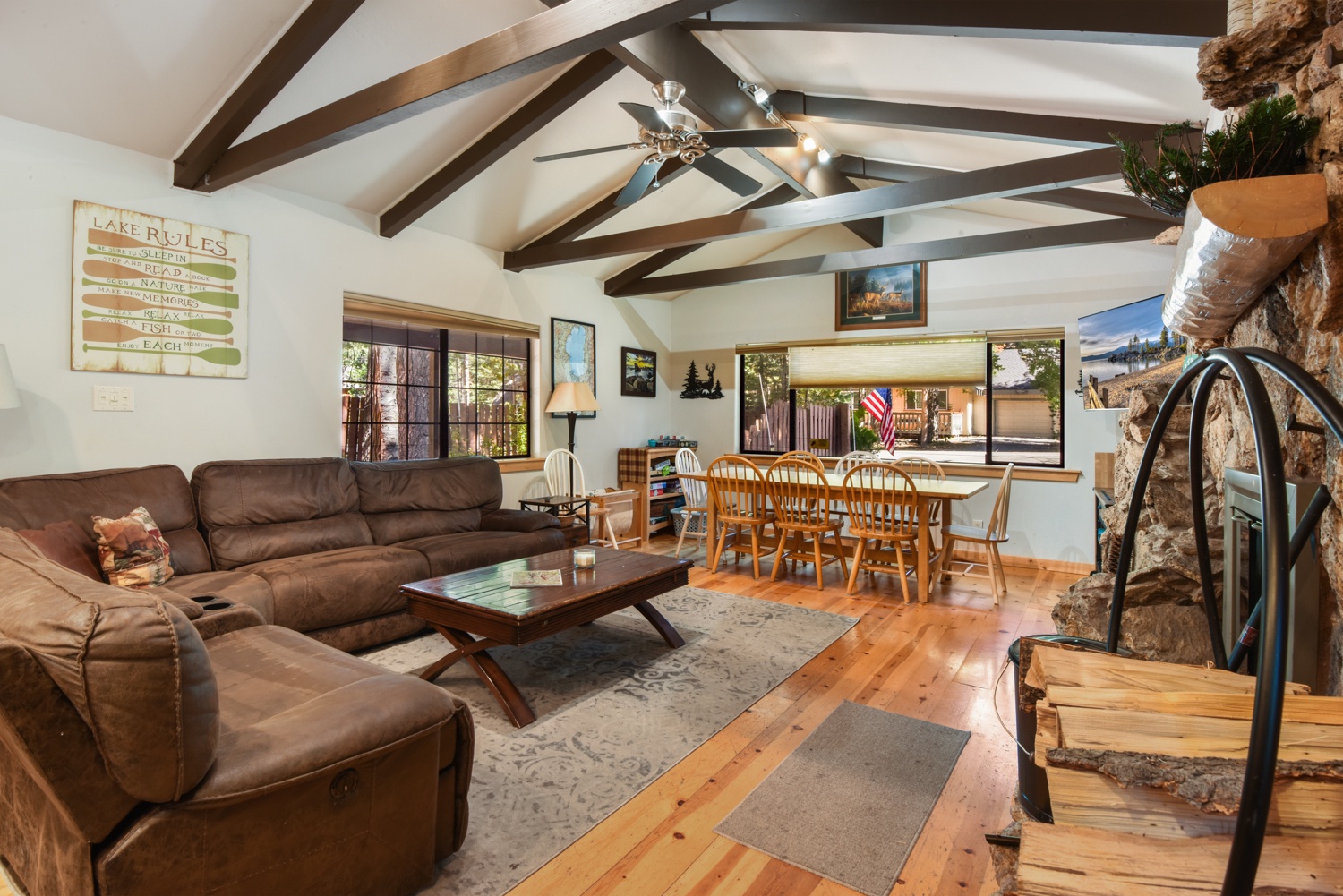 Living space with sectional sofa, fireplace, and Smart TV