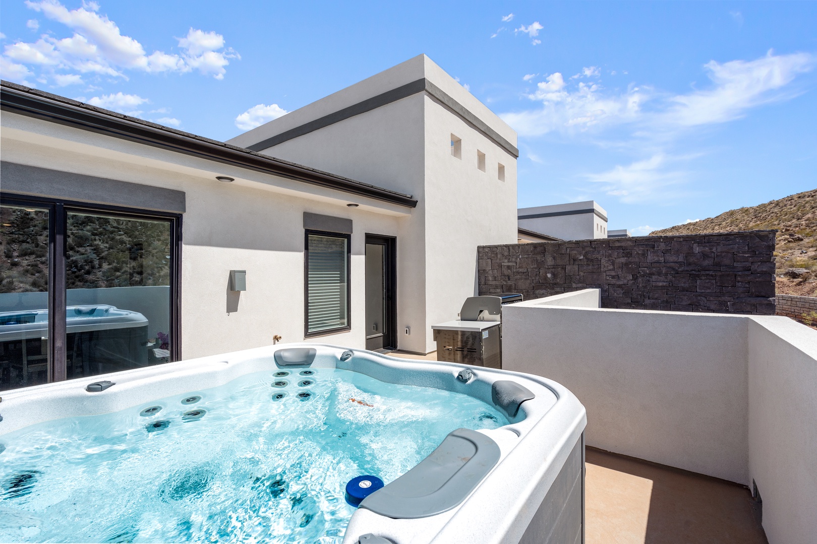 Bask in bubbling hot tub bliss or lounge in the sunshine on the rooftop deck!