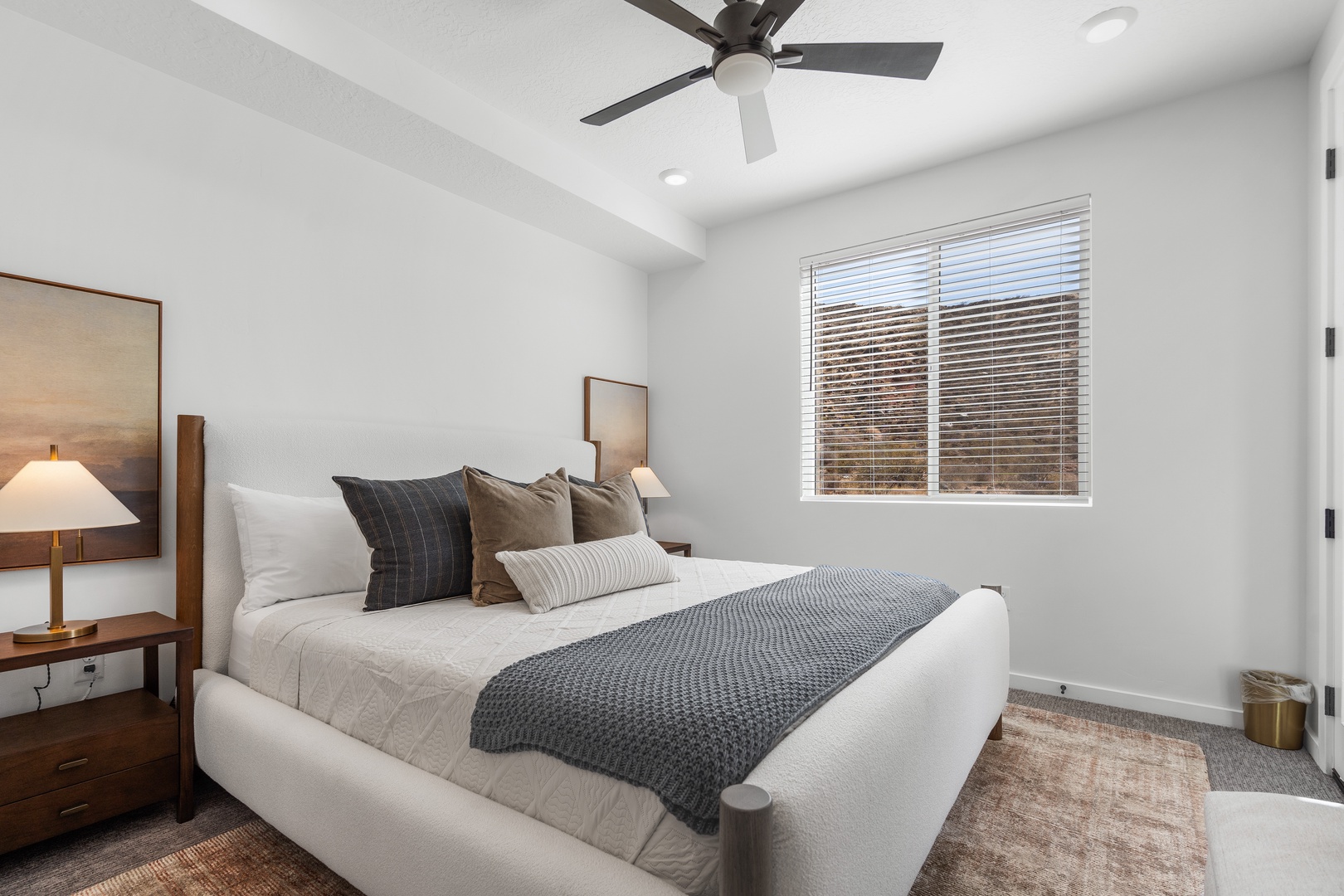 Bedroom 2 with king bed balcony, Smart TV, and ensuite