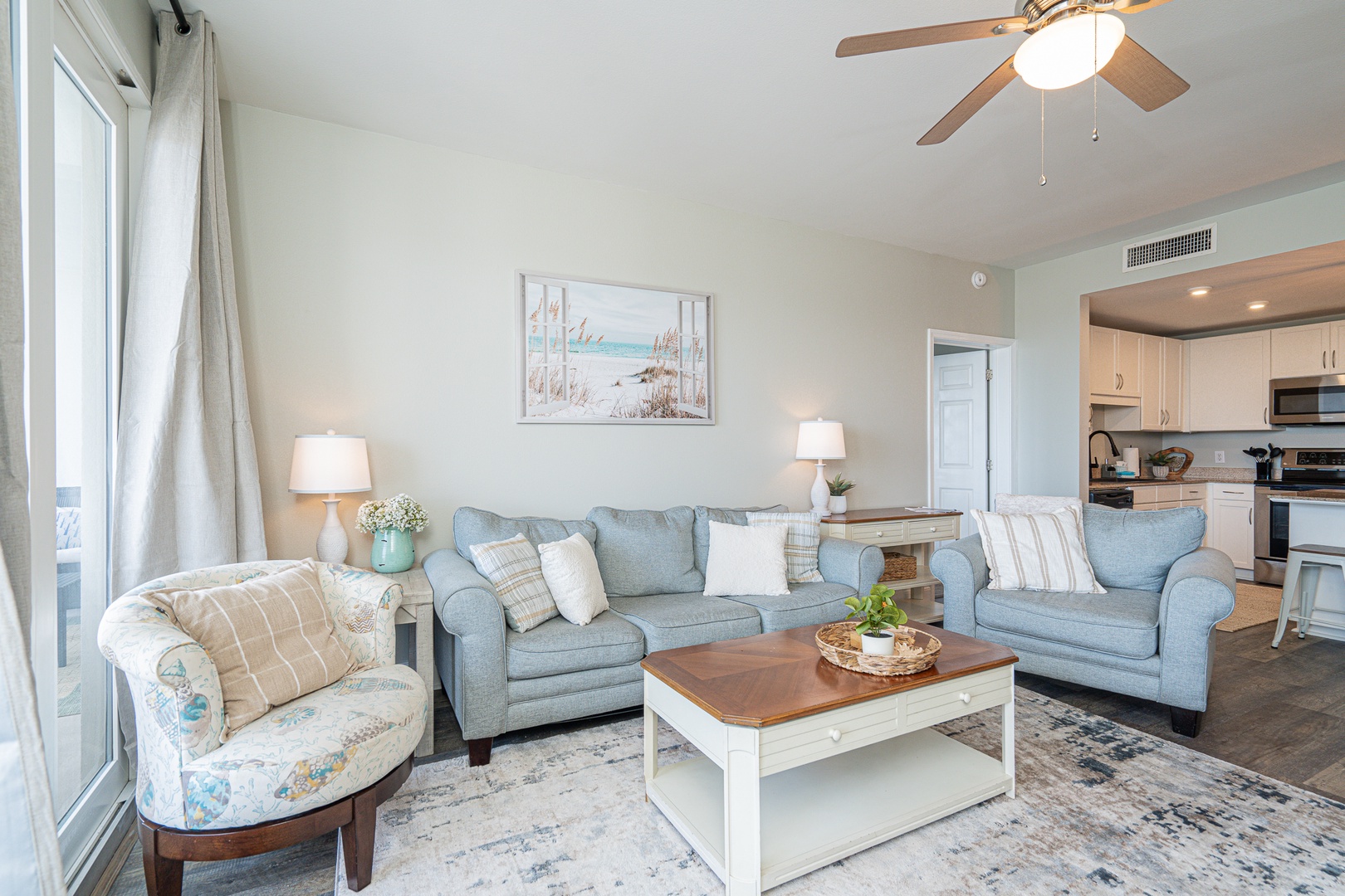Coastal comfort awaits in the living room, with Smart TV & stunning views