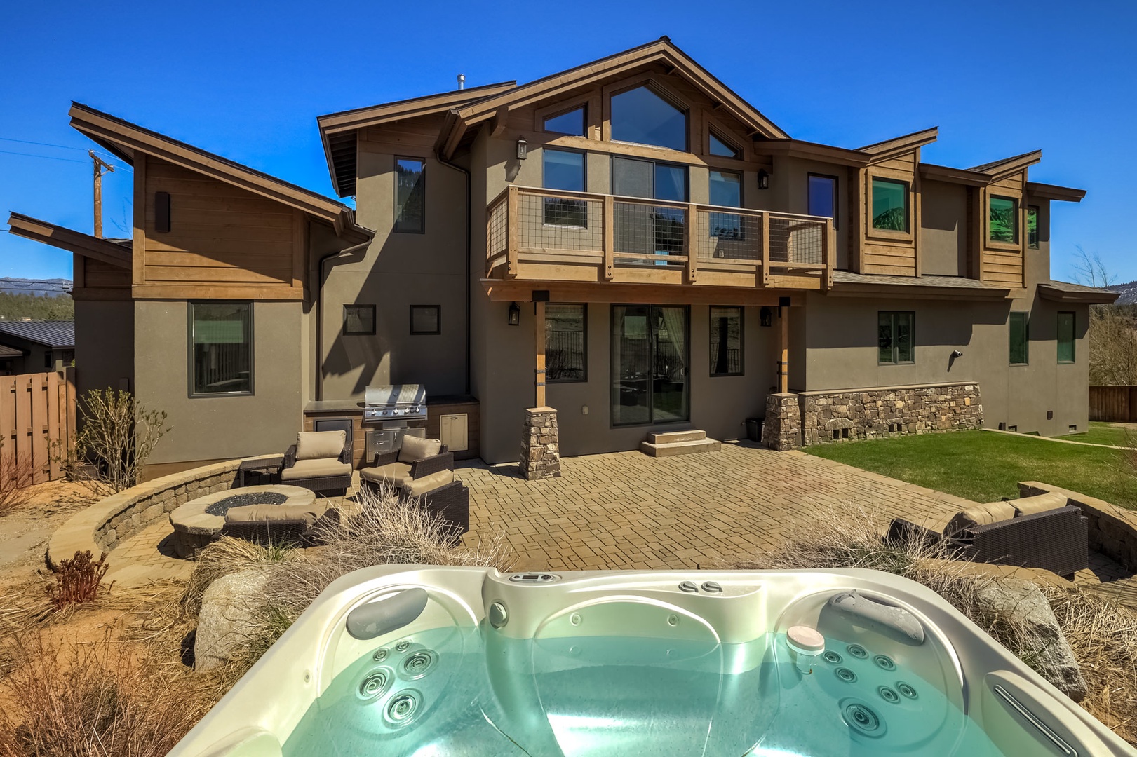 Soak in the views while in the hot tub accessible year round