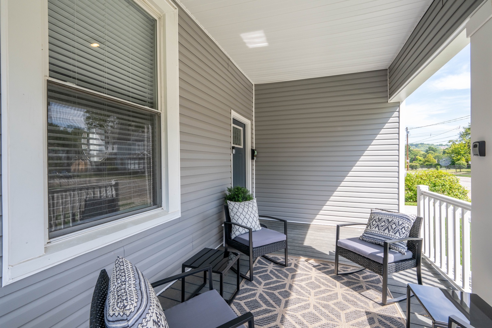 Relax & enjoy the fresh air on the spacious front porch