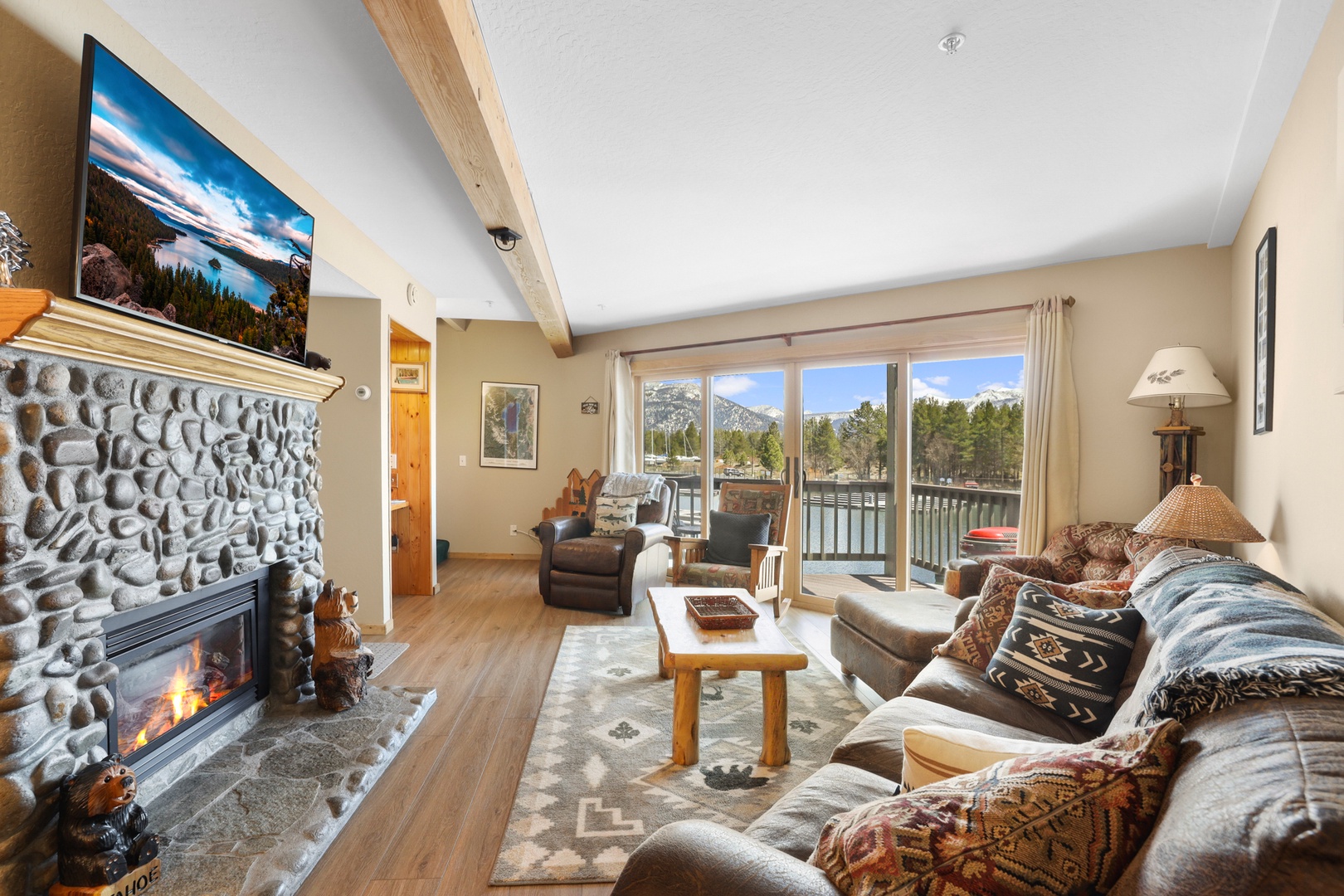 Living area with ample seating, deck, Smart tv, and sofa sleeper