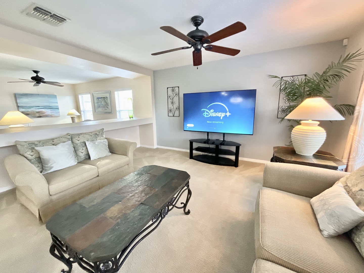 Living area with ample seating and Smart TV